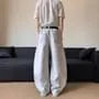 Mid Rise Plaid Panel Washed Wide Leg Jeans