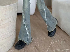 Mid Rise Washed Distressed Flared Jeans