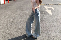 Knot Asymmetrical Lace Cropped Halter Top / Low Rise Washed Wide Leg Jeans